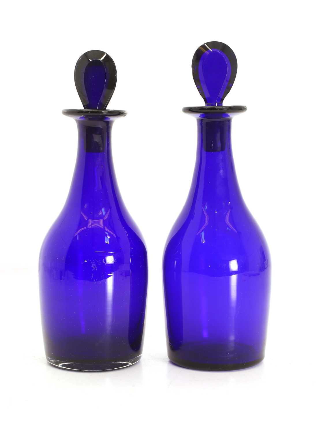 Lot 153 - A pair of blue glass decanters and stoppers