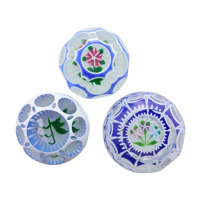 Lot 42 - A group of three John Deacons cased glass paperweights
