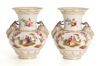 Lot 102 - A pair of KPM porcelain ram's head vases