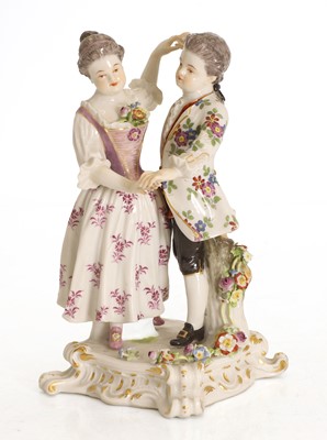 Lot 104 - A Meissen figural group
