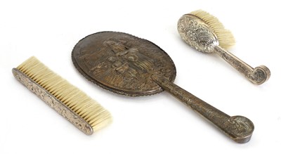 Lot 48 - A three piece silver cased dressing set