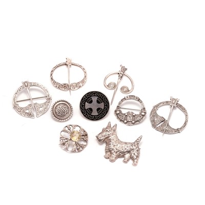 Lot 245 - A collection of Scottish-themed silver brooches