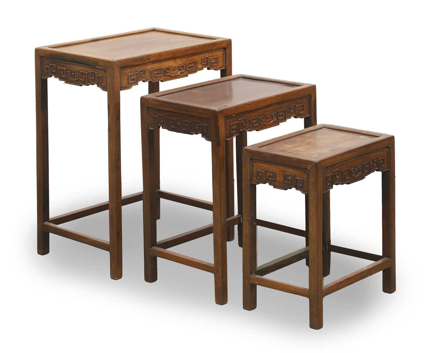 Lot 520 - A Chinese wooden nest of tables