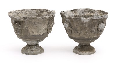 Lot 301 - A pair of lead urns
