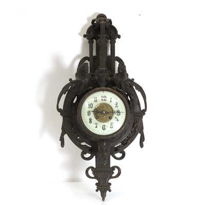 Lot 203 - A French bronze wall mounted clock