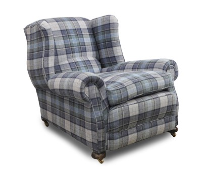 Lot 501 - An upholstered club armchair