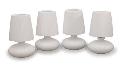 Lot 483 - A collection of four Bover lamps