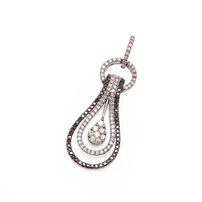 Lot 115 - An 18ct white gold diamond and black diamond pendant
