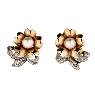 Lot 134 - A pair of pearl and diamond screw back earrings