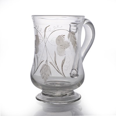 Lot 16 - An engraved glass mug