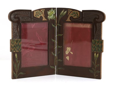 Lot 398 - A painted and carved double photograph frame