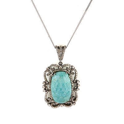 Lot 158 - A carved aquamarine and diamond pendant necklace