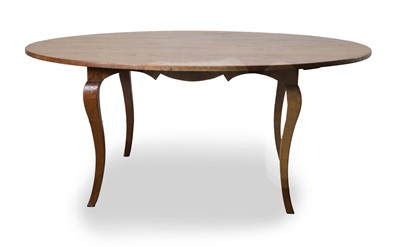 Lot 542 - A French Farmhouse style oak round dining table
