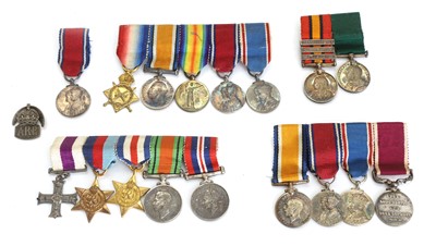 Lot 393 - Four groups of Victorian, WWI and WWII miniature medal groups