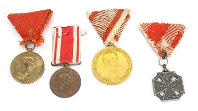 Lot 390 - An Austrian gold grade Bravery Medal and a Merit Cross