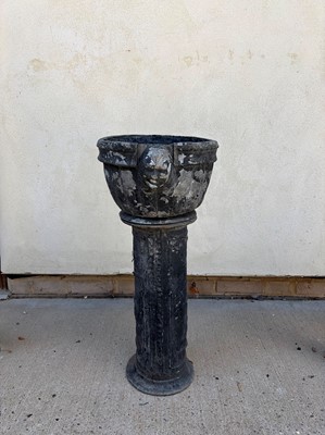 Lot 553 - A lead jardinière and stand