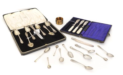 Lot 24 - An assorted group of cased silver flatware
