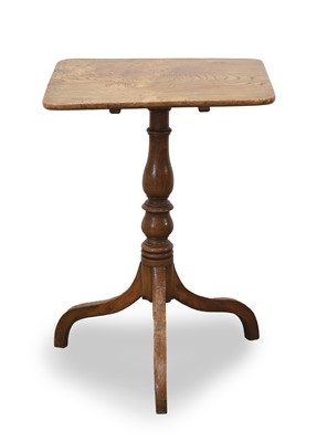 Lot 515 - A small elm tripod table