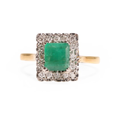 Lot 93 - An 18ct gold emerald and diamond cluster ring