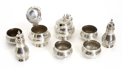 Lot 15 - A set of silver salts, pepperettes, and mustards
