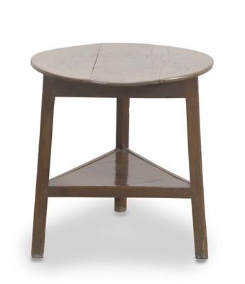 Lot 523 - A George III oak two tier cricket table