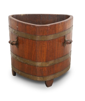 Lot 525 - A teak log bucket