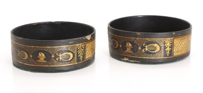 Lot 309 - A pair of black japanned bottle coasters