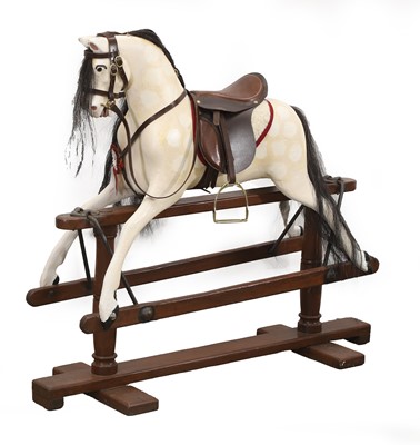 Lot 535 - A dapple grey rocking horse