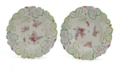 Lot 117 - Two Longton Hall porcelain strawberry leaf moulded plates