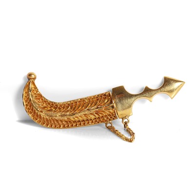Lot 309 - A Middle Eastern gold jambiya brooch