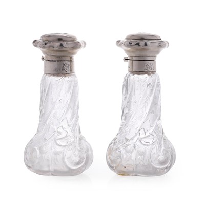 Lot 71 - A pair of silver-mounted Stevens & Williams intaglio cut-glass scent bottles