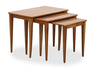 Lot 532 - A Gordon Russell walnut nest of three tables
