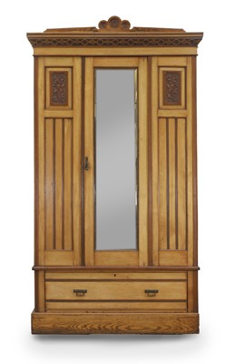 Lot 533 - An Arts and Crafts ash wardrobe