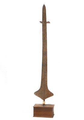 Lot 304 - An African topek tribe iron currency sword (Liganda)