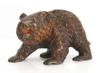 Lot 338 - A black forest-style carved wooden bear