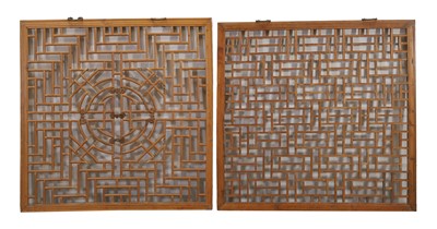Lot 78 - A pair of pierced wooden window panels