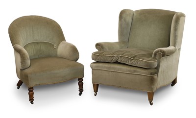 Lot 543 - A Edwardian wing armchair in the manner of Howard and Sons