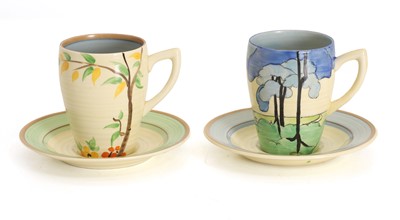 Lot 118 - A Clarice Cliff 'Blue Firs' pattern cup and matched saucer