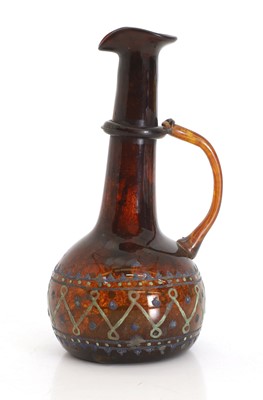 Lot 155 - A Romanesque glass ewer