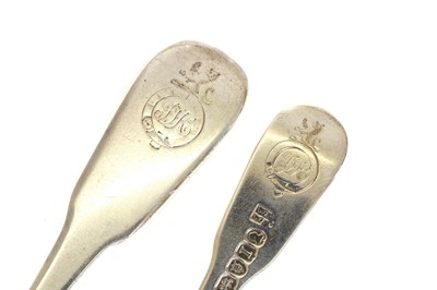 Lot 12 - A collection of George III and George IV matched silver fiddle pattern flatware