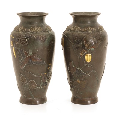 Lot 57 - A pair of Japanese bronze mixed-metal inlaid vases