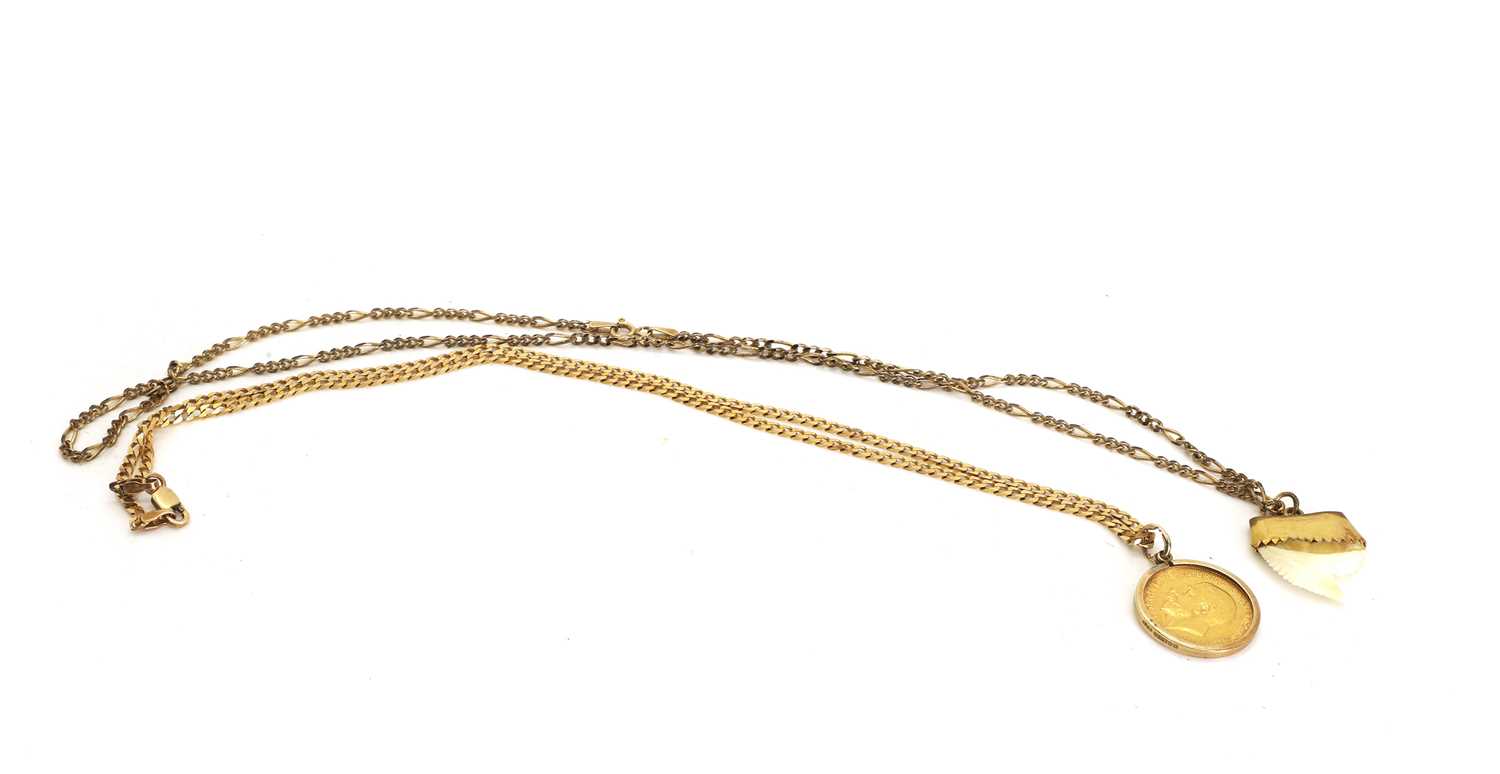 Lot 1 - Two pendants on chains