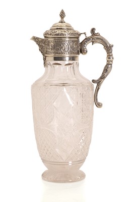 Lot 20 - A cut glass and silver claret jug