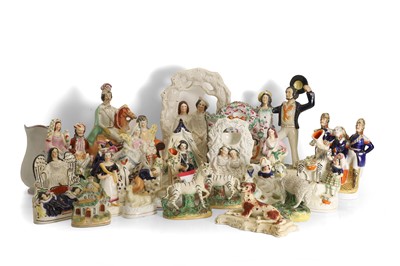 Lot 101 - A collection of Staffordshire figures