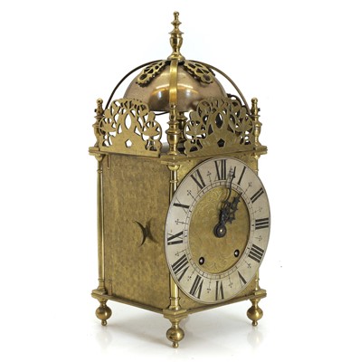 Lot 202 - A brass lantern clock