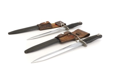 Lot 386 - Two Swiss SGW57 bayonets