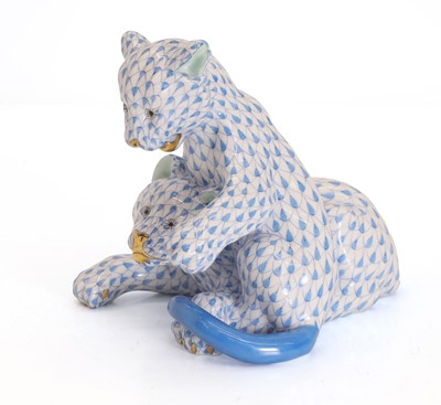 Lot 112 - A Herend porcelain model of two lion cubs