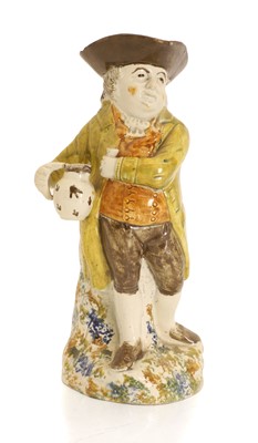 Lot 136 - A Prattware Hearty Good Fellow Toby jug